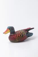 An Indonesian duck toy made of wood and painted in an attractive color photo