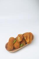 Indonesian food is often called Risol or Risoles with white background photo