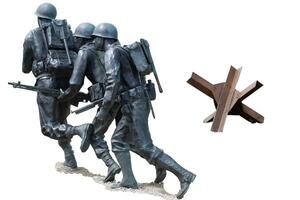 Normandy France D-Day memorial hedgehog soldiers sculptures clipping path isolated photo
