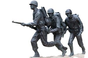 Normandy France D-Day memorial landing craft soldiers sculptures clipping path isolated photo