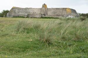 Normandy France D-Day stronghold bunker on hill at Utah beach area photo