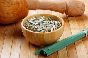 portion of dried organic lemongrass on rustic wooden table photo