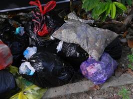 Waste that can damage the environment is often found in urban areas with poor waste management photo