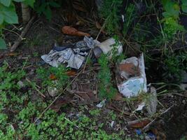 Waste that can damage the environment is often found in urban areas with poor waste management photo