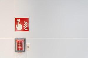 Fire alarm on the wall. fire warning equipment for emergency. copy space. photo