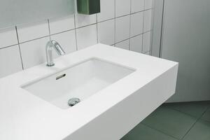 Bathroom interior with sink and faucet. Modern washbasin with chrome faucet photo