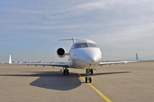 business plane parked at the airport photo