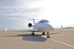 business plane parked at the airport photo