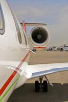 business plane parked at the airport photo