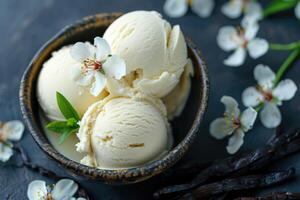 Vanilla ice cream with flowers and vanilla pods photo