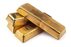 Stack of shiny gold bars on white background photo