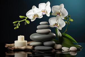 Spa stones, bamboo branches and white orchid photo