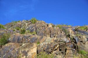 Petroglyphs within the Archaeological Landscape of Tamgaly. Almaty area, Kazakhstan photo