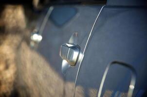 close-up of automobile handle of door photo