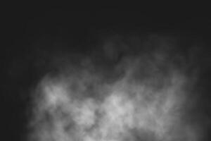 White smoke isolated on black background photo