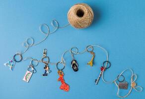 Souvenirs keychains from different cities of the world photo