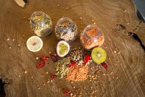 Raw cereals set on wooden background photo