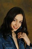 A portrait of a young woman in the studio photo