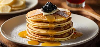 Pancakes, butter, syrup. Stack of golden pancakes on white plate, melting butter on top, syrup pouring over, steam rising. photo