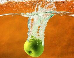 Green apples in water photo