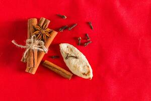 Decoration anise stars, orange slices, cinnamon and cloves photo