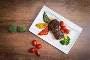Steak with vegetables photo