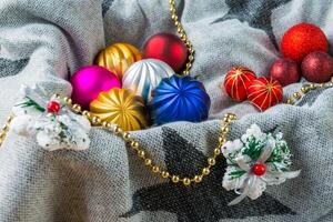 Christmas decorations on a color background. New year toys. photo