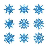 un conjunto de copos de nieve siluetas vector