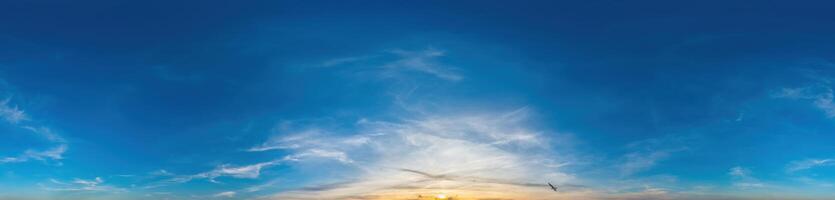 Sky panorama with Cirrostratus clouds in Seamless spherical equirectangular format as full zenith for use in 3D graphics, game and composites in aerial drone 360 degree panoramas for sky replacement. photo