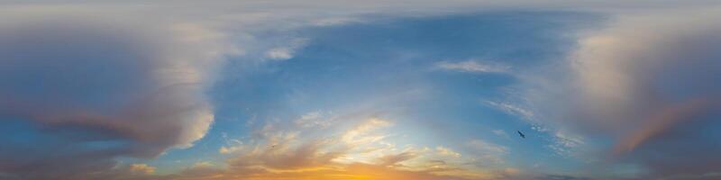 Panorama of a dark blue sunset sky with pink Cumulus clouds. Seamless hdr 360 panorama in spherical equiangular format. Full zenith for 3D visualization, sky replacement for aerial drone panoramas. photo