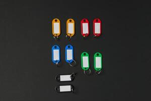 Collection of a key fob on black background photo