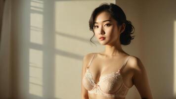 Sunny and optimistic Asian lingerie model in softly lit studio showcasing classic pin up style photo