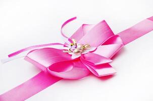 gift ribbon and bow isolated over white photo