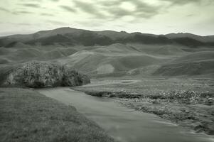 The mountain river in twilight, Almaty area, Assy photo