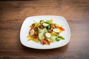 Vegitable salad with murshrooms, capsicum and salat photo