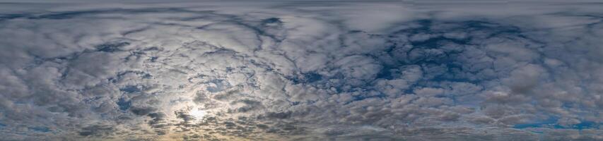 Sky panorama with Stratocumulus clouds in Seamless spherical equirectangular format. Full zenith for use in 3D graphics, game and editing aerial drone 360 degree panoramas for sky replacement. photo