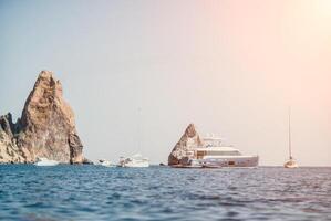 yacht on calm sea. Luxury cruise trip. View from above of white photo