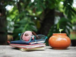 work space in garden green garden background relax and tecnology mobile photo