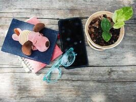work space in garden green garden background relax and tecnology mobile photo