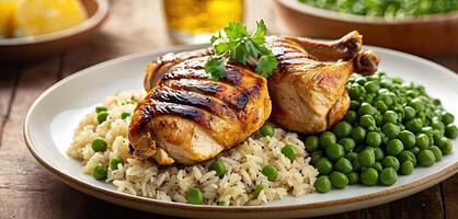 Grilled chicken, with rice and green peas served on plate, wooden rustic table background. Close-up view, grilled chicken thigh with grill marks, surrounded by rice and green peas . photo
