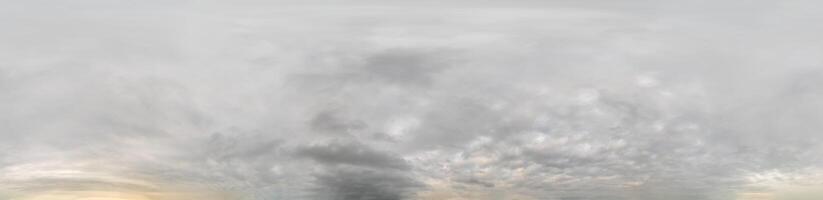 sky panorama on overcast rainy day with low clouds in seamless spherical equirectangular format. Complete zenith for use in 3D graphics, game and for aerial drone 360 degree panorama as a sky dome. photo