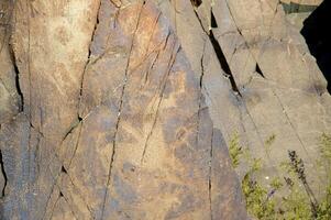 Petroglyphs within the Archaeological Landscape of Tamgaly. Almaty area, Kazakhstan photo