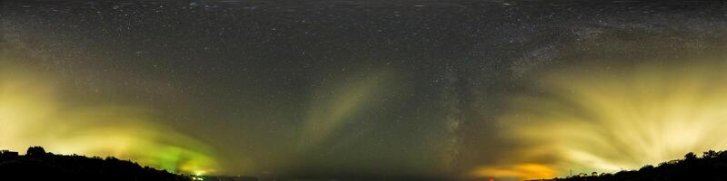 sky part of seamless panorama on summer night with stars, milky way clouds, without ground, for easy use in 3D graphics and composites in aerial spherical panoramas as a sky dome. photo