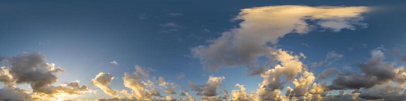 Dark blue sunset sky panorama with Cumulus clouds. Seamless hdr pano in spherical equirectangular format. Complete zenith for 3D visualization, game and sky replacement for aerial drone 360 panoramas. photo