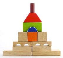 Wooden toy blocks on white background photo