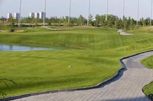 Fine golf club in foothills of Zailiyskiy Alatau photo