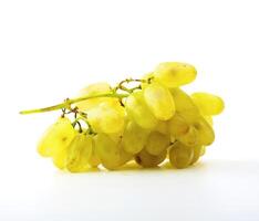 Ripe green grape on a white background photo