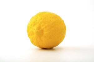 Ripe Lemon on the white background photo