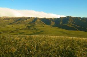 Beautiful view of valley with the mountains photo