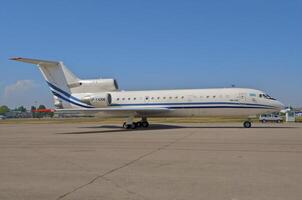 business plane parked at the airport photo